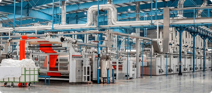 alt="Automated manufacturing line used for quality inspection and defect detection"